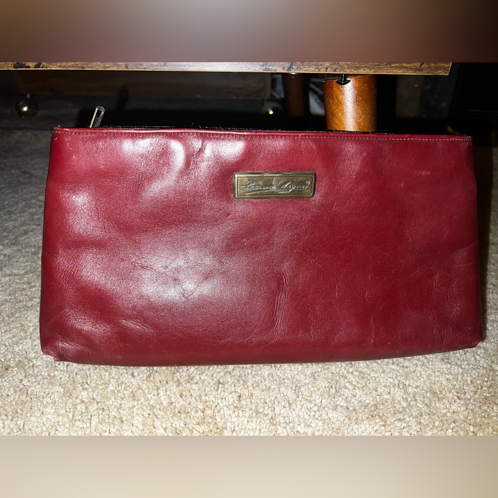 Vintage Aigner oxblood clutch